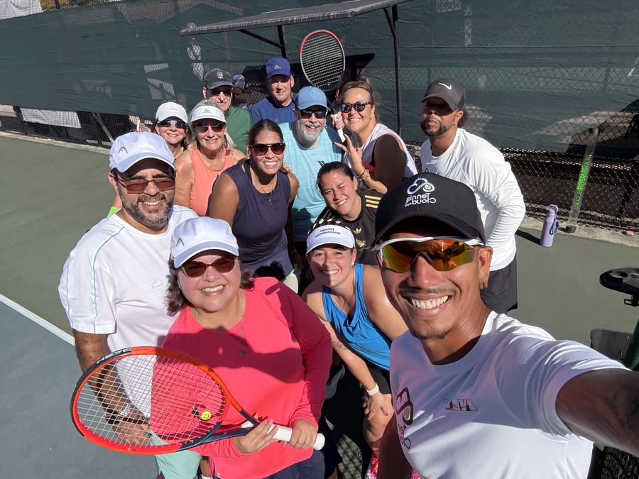 Coach Liam’s selfie with a big group of players on court