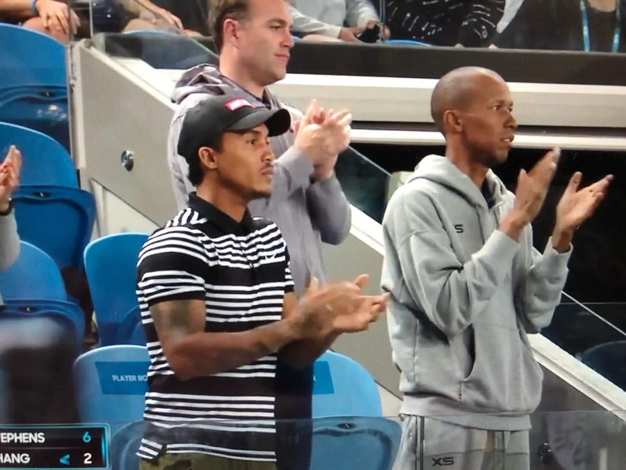 Coach Liam and players applauding at a pro tournament